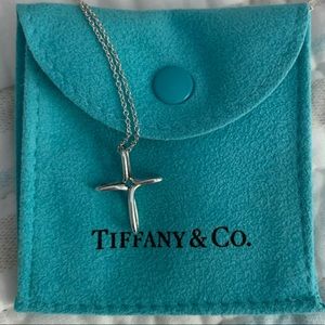 Tiffany & Co. small infinity cross necklace.